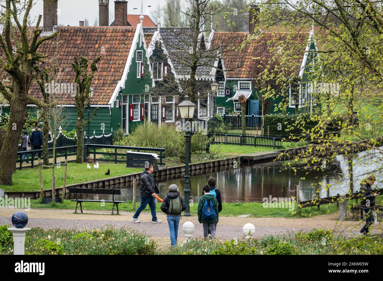 Zaanse Schans, typical traditional houses next to the canal, Zaanstad Municipality, European Route of Industrial Heritage, Netherlands. Stock Photo