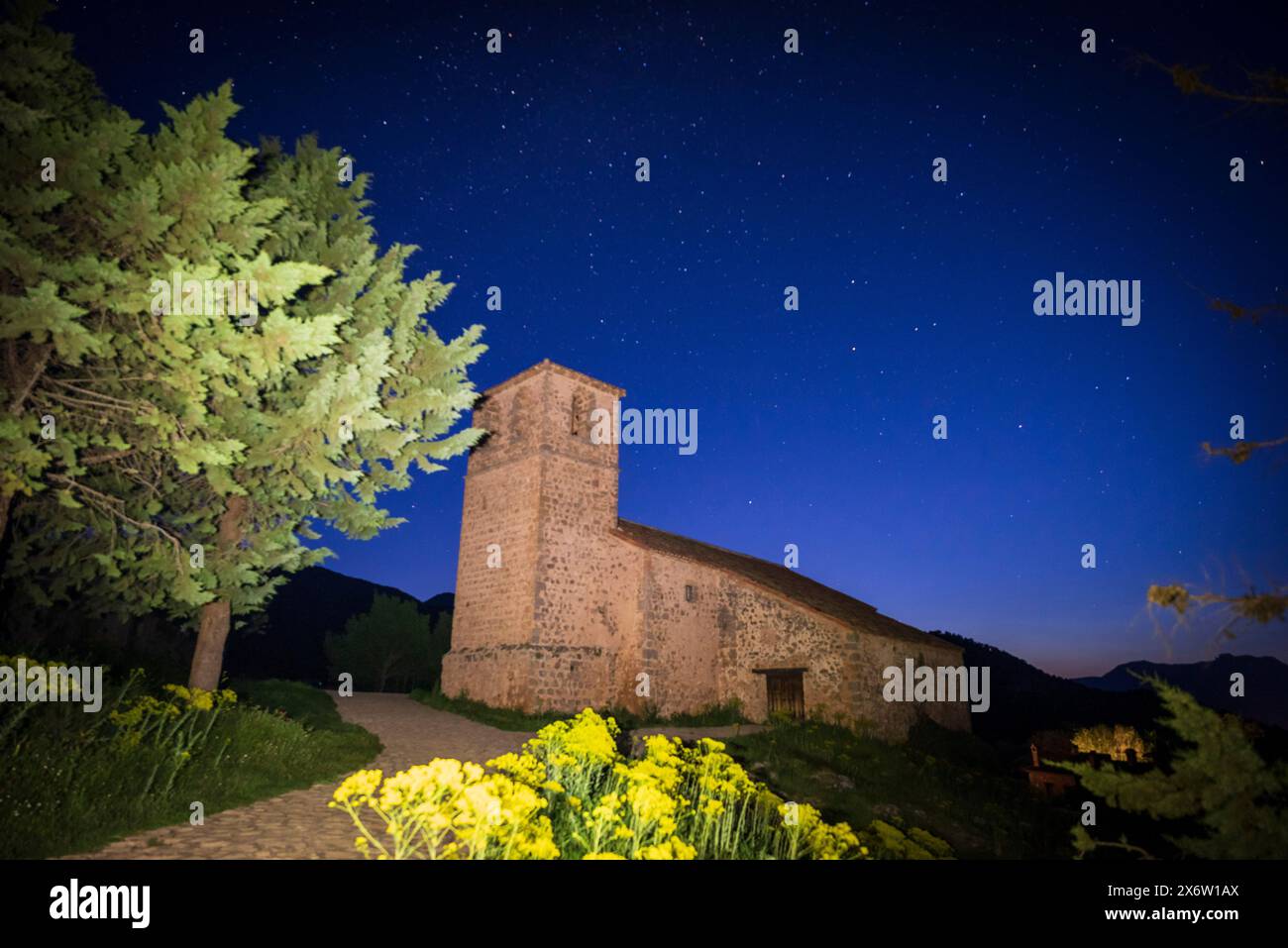 old church of the Holy Spirit and starry sky, stellar viewing point of the star route in Sierra de Segura, Riópar Viejo ,Albacete province, Castilla-La Mancha, Spain. Stock Photo