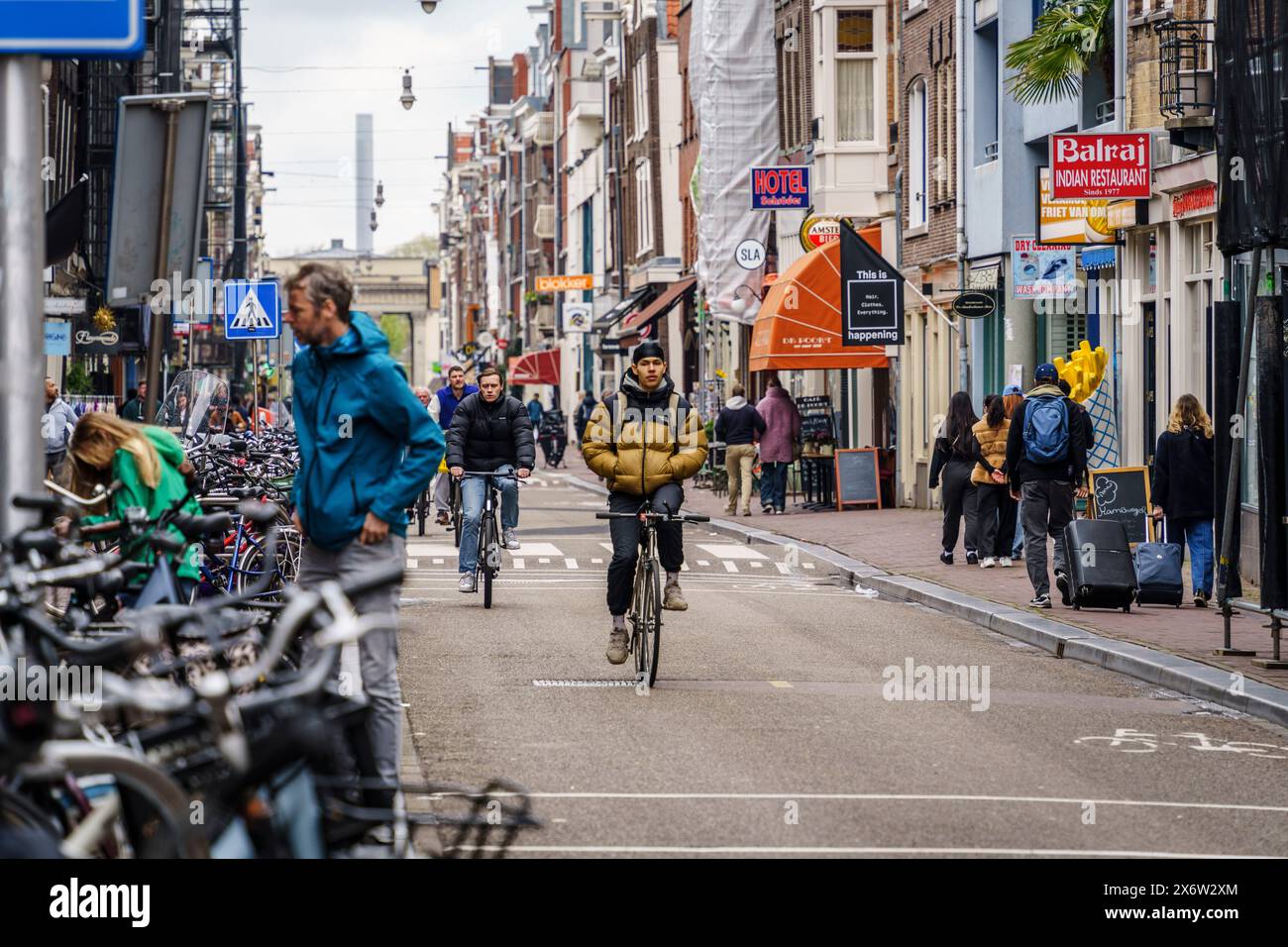 bicycles on Haarlemmerdijk street, Amsterdam, Netherlands. Stock Photo