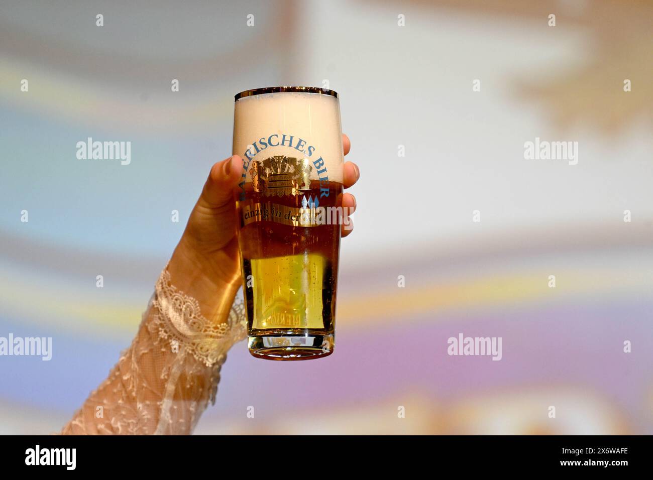 Munich, Germany. 16th May, 2024. Candidate Eva Singer stands on stage ...