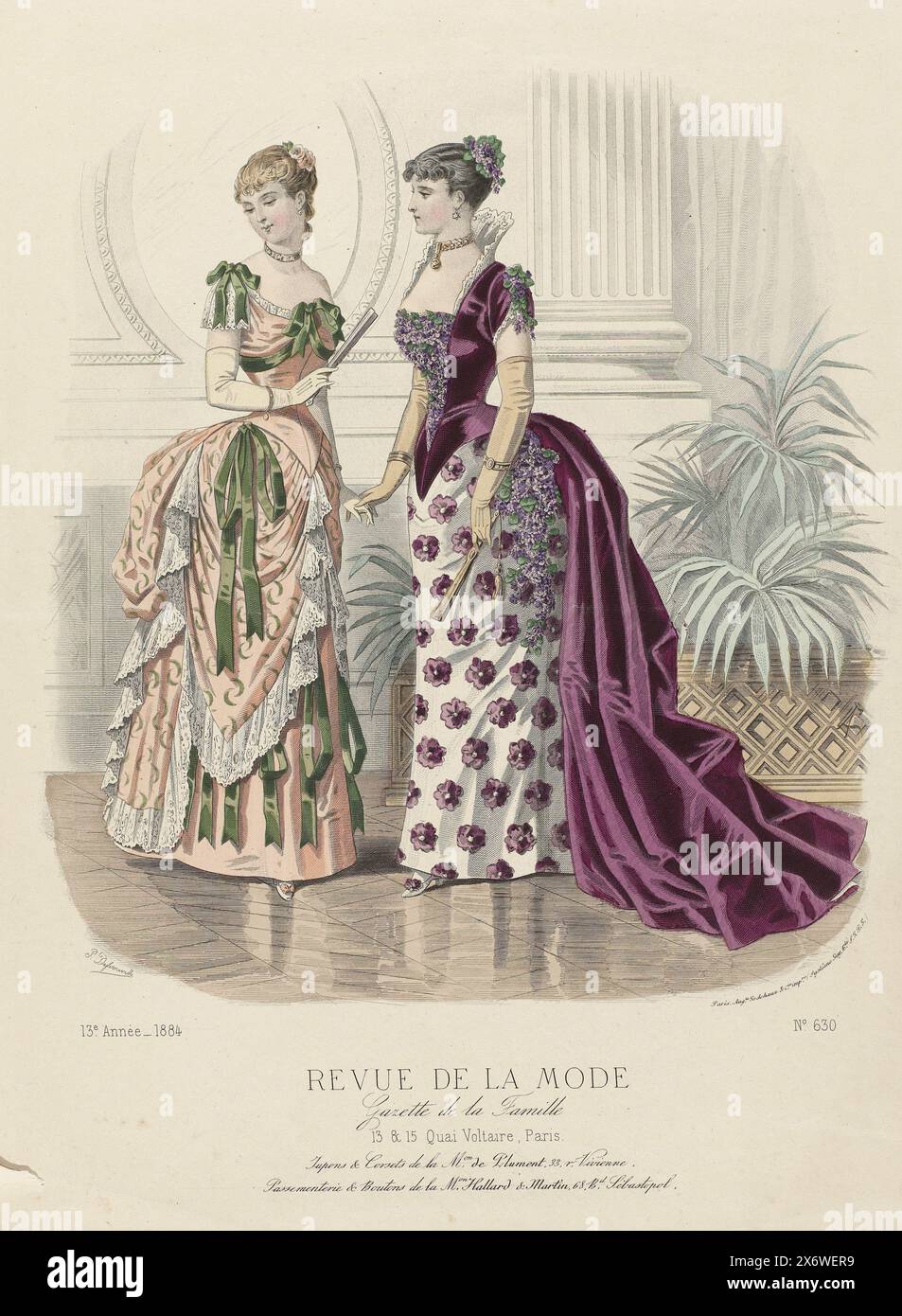 Revue de la Mode, Gazette de la Famille, 24 Janvier 1884, 13e annee, No. 630: Jupons & Corsets (...), Two women in an interior. Left: Dress of plain light pink silk and 'brocatelle' decorated with white lace and green ribbons. Long gloves made of light suede. Right: dress of white brocaded satin and wine red (claret) velvet or satin decorated with purple flowers. Below the performance are some lines of advertising text for various products. Print from the fashion magazine Revue de la Mode (1872-1913). Detailed description of the clothing on page 27 'PLANCHE COLORIÉE'., print maker: A Stock Photo