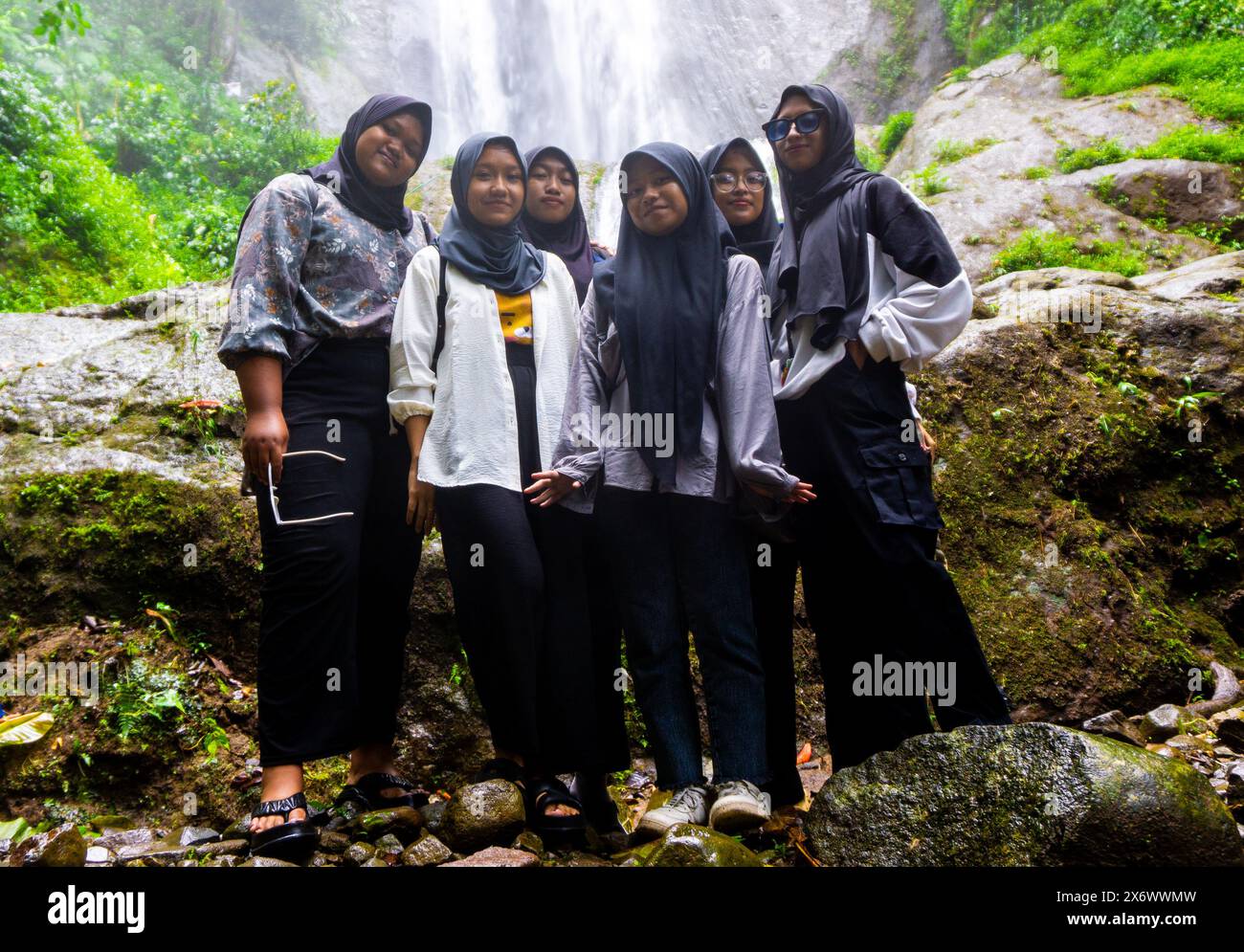 People vacation at dolo waterfall. Dolo is one of the waterfalls in ...