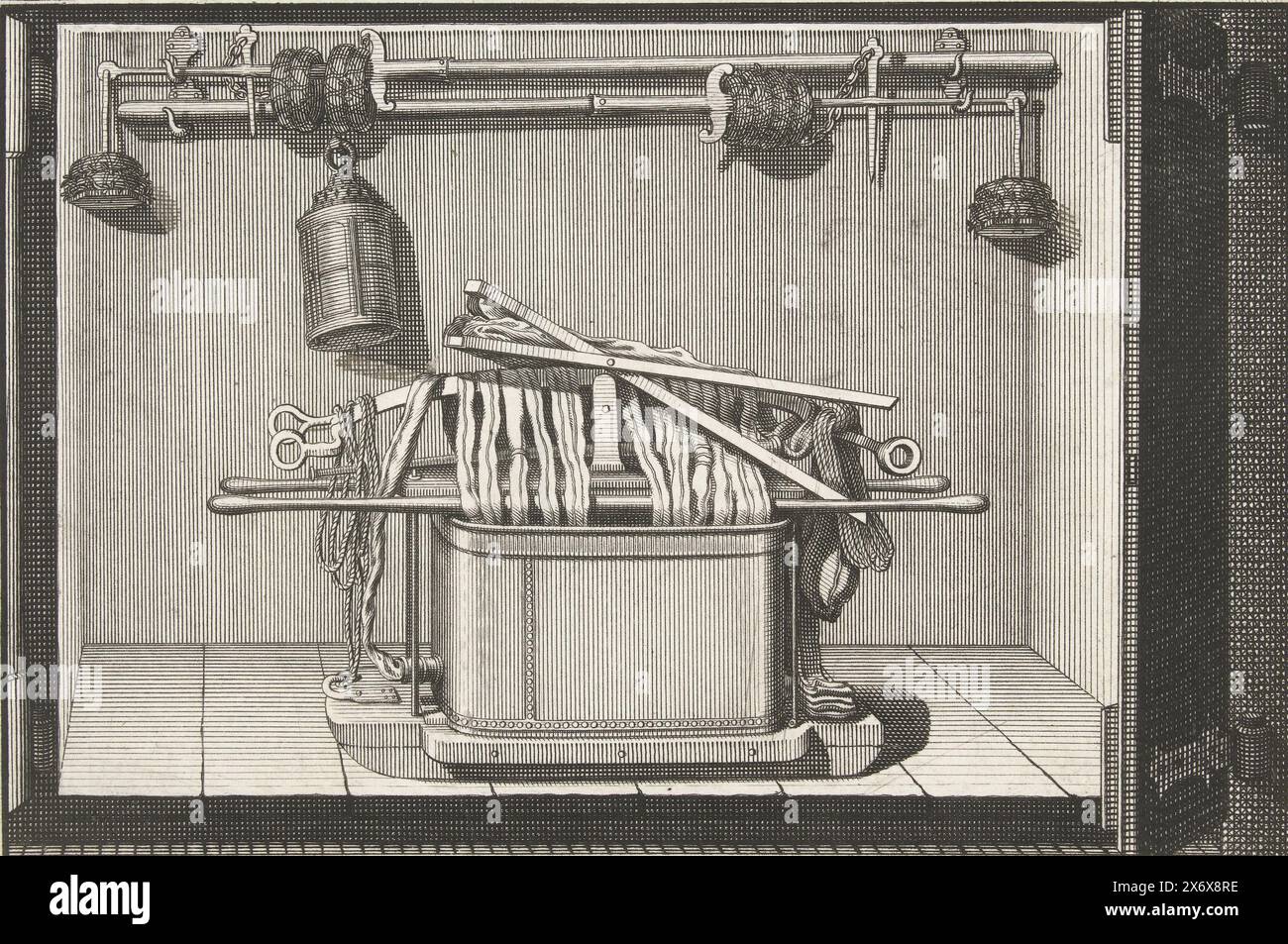 How the fire hose and pump should be stored in the fire engine house after use, approximately 1750, An illustration of how the fire hose and pump should be stored in the fire engine house after use, approximately 1750? Belongs to the supplements to the Fire Spray Book by Jan van der Heyden., print, print maker: anonymous, Northern Netherlands, 1700 - 1799, paper, etching, engraving, height, 133 mm × width, 200 mm Stock Photo