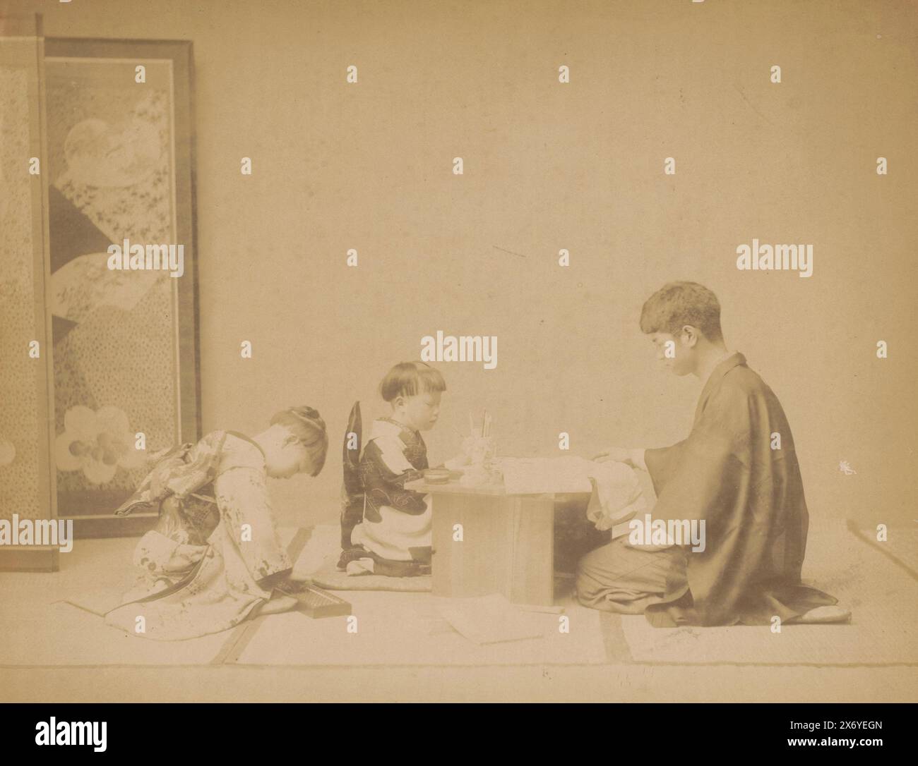 Teacher with two students in Japan, Japan, teacher and school boys (title on object), photograph, anonymous, Japan, 1860 - 1900, paper, albumen print, height, 195 mm × width, 230 mm, height, 210 mm × width, 264 mm Stock Photo