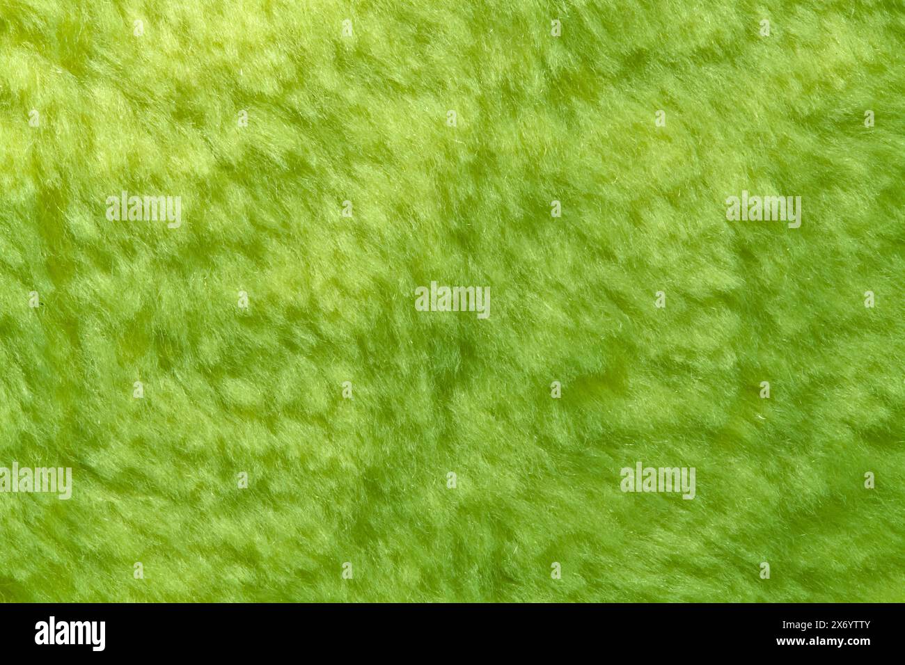 The texture of the synthetic hairy green material Stock Photo