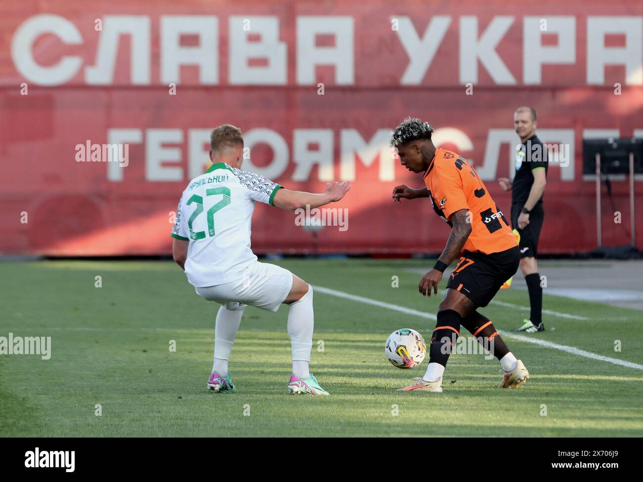 Non Exclusive: RIVNE, UKRAINE - MAY 15, 2024 - Defender Illia Krupskyi (L) of FC Vorskla Poltava and midfielder Kevin of FC Shakhtar Donetsk are seen Stock Photo