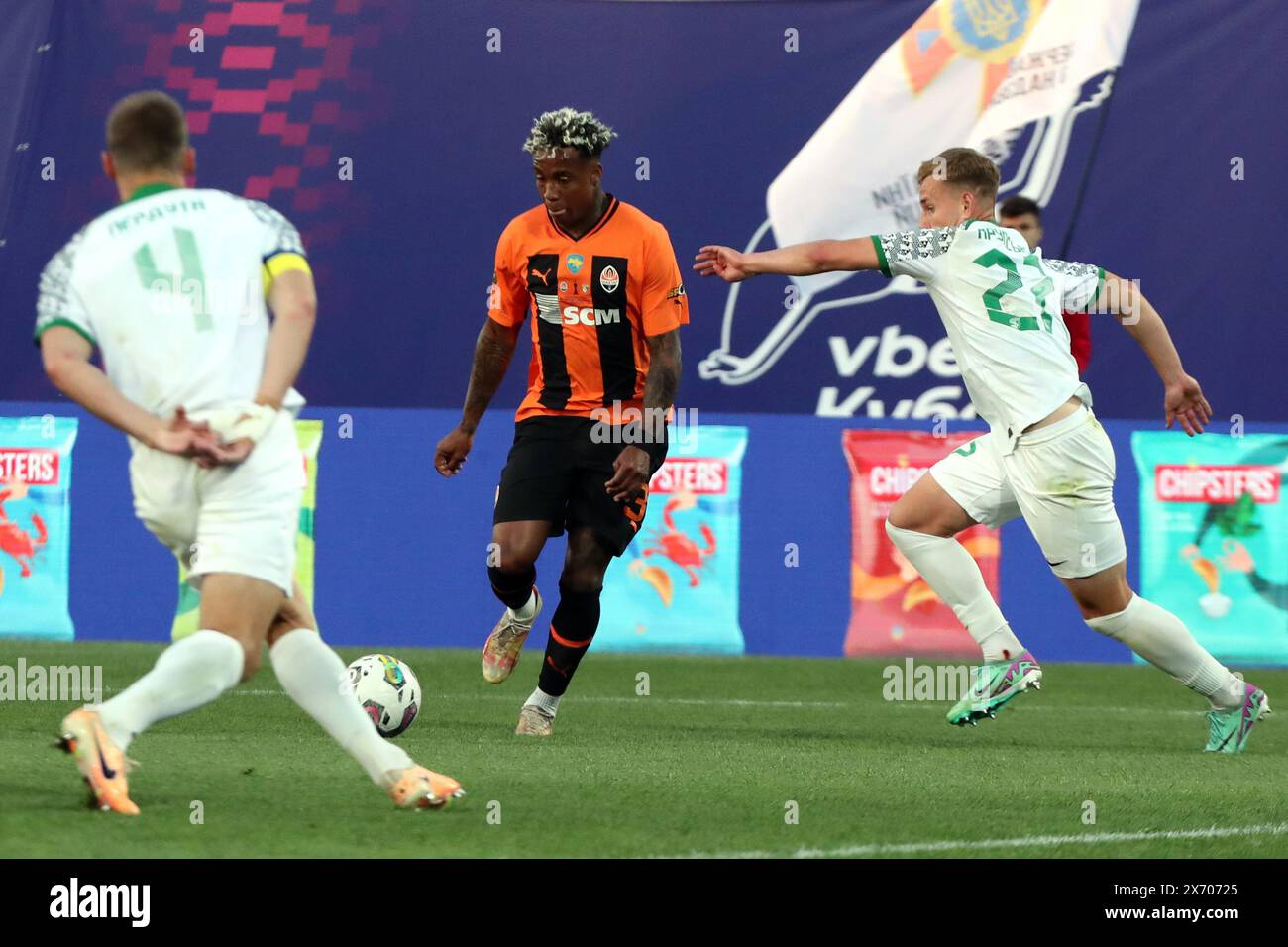 Non Exclusive: RIVNE, UKRAINE - MAY 15, 2024 - Midfielder Kevin of FC Shakhtar Donetsk is seen in action with players of FC Vorskla Poltava during the Stock Photo