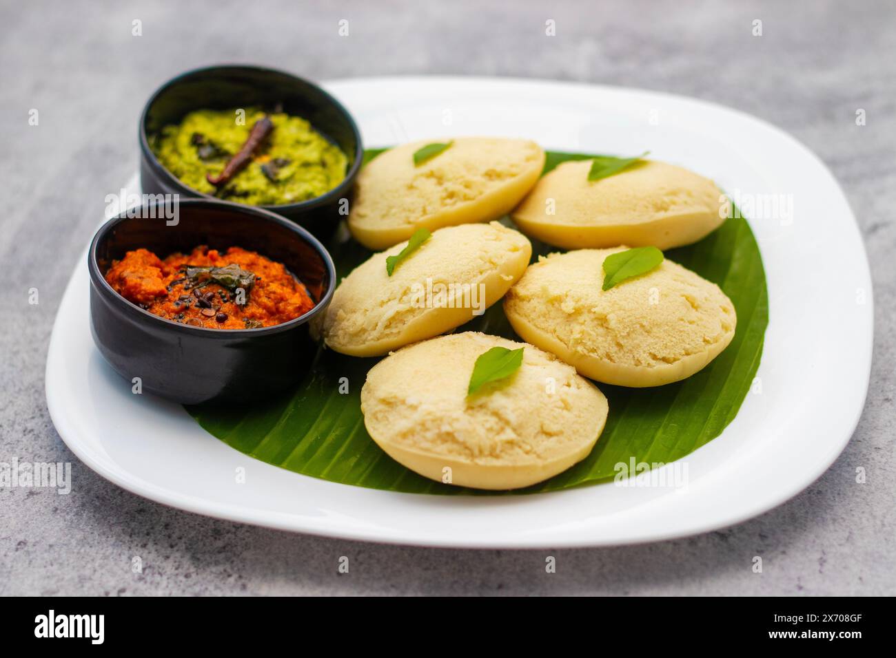 selective focus of South Indian famous food 'Idli vada' with Sambar and Chatney. Stock Photo