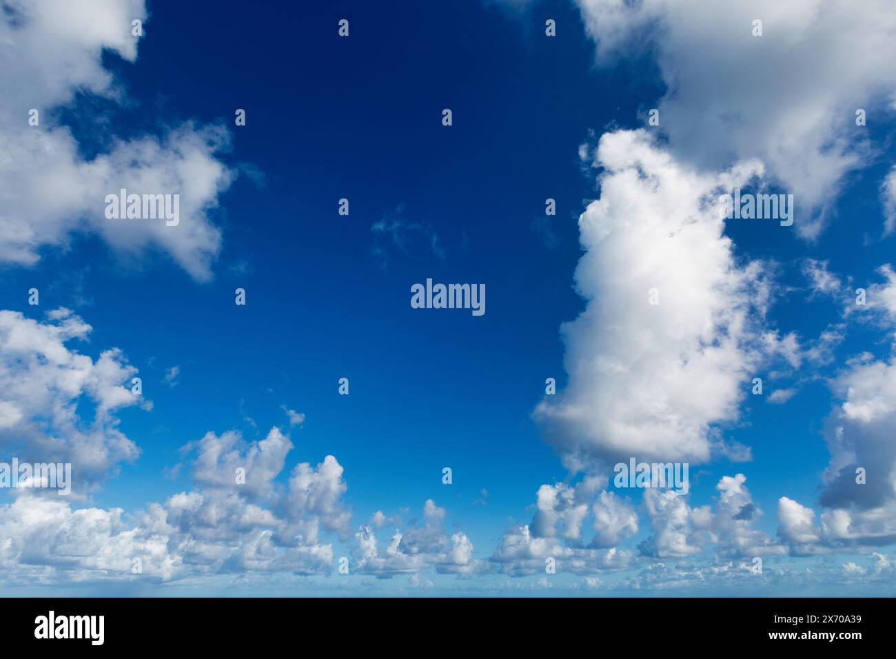 Blue sky with beautiful white clouds background Stock Photo - Alamy