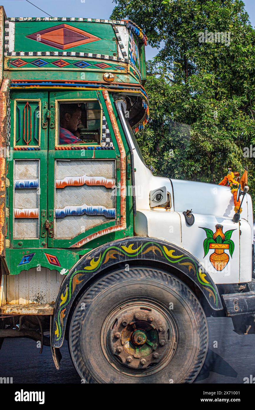 Highly decorated truck of India on the road side near new Delhi . Stock Photo