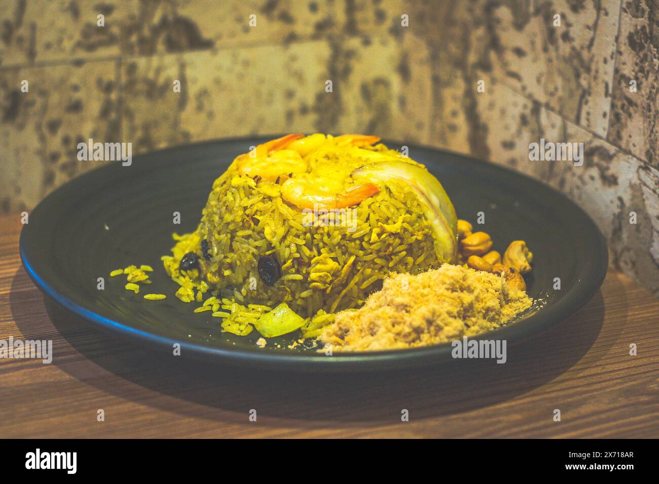 pineapple fried rice with shrimp, raisins, cashews and pork floss on