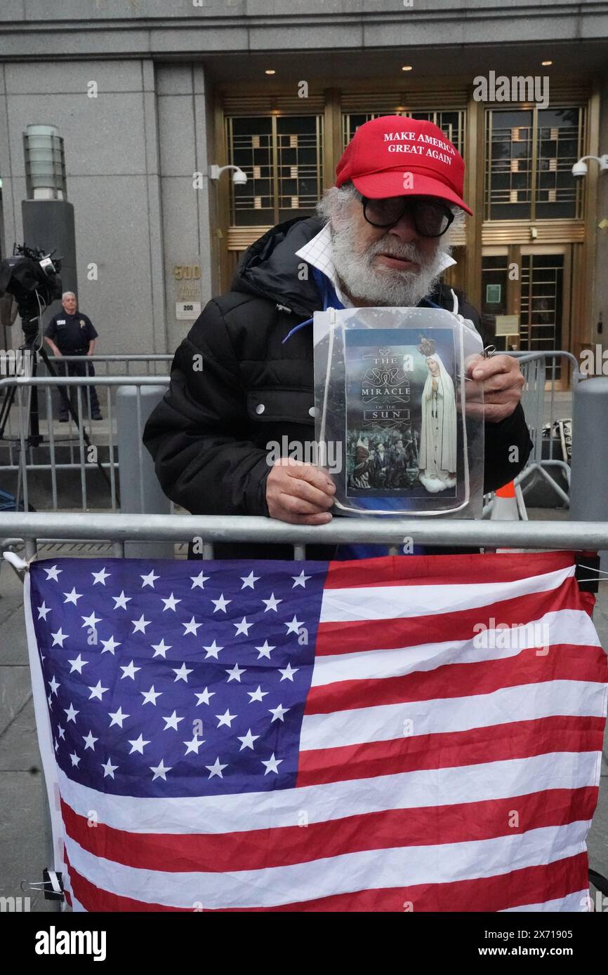 New York, United States. 15th May, 2024. Trump supporters outside the Criminal Court Building wait for Donald Trump's motorcade to leave after the final day of Michael Cohen's testamony. Credit: SOPA Images Limited/Alamy Live News Stock Photo