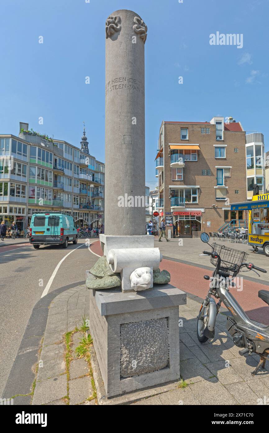 Amsterdam, Netherlands - May 16, 2018: Monument Grenspaal Stone Turtle Column Boundary Post in Front of Rembrandt House Museum. Stock Photo