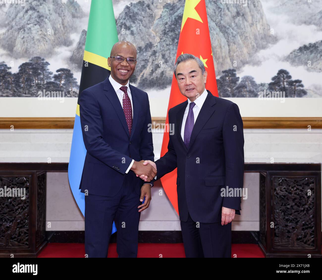 Beijing, China. 17th May, 2024. Chinese Foreign Minister Wang Yi, also a member of the Political Bureau of the Communist Party of China Central Committee, holds talks with January Yusuf Makamba, Tanzania's Minister for Foreign Affairs and East African Cooperation, in Beijing, capital of China, May 17, 2024. Credit: Liu Bin/Xinhua/Alamy Live News Stock Photo