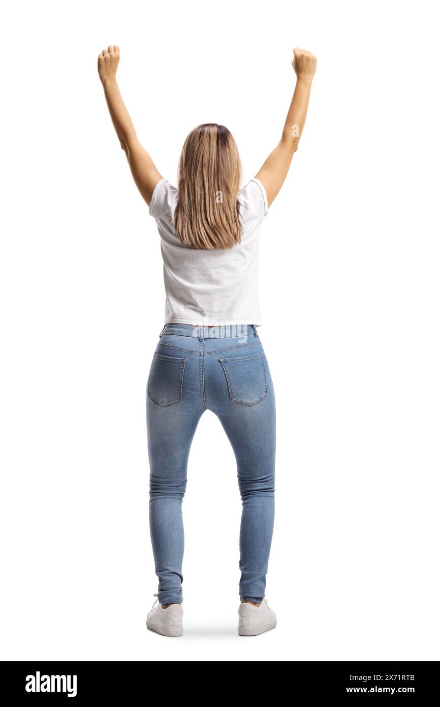 Rear view shot of a happy young woman cheering with arms up isolated on ...