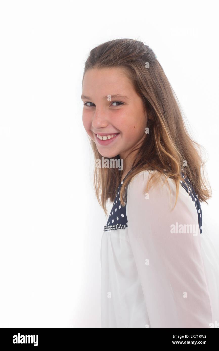portrait of a cheerful preteen girl on white background Stock Photo - Alamy