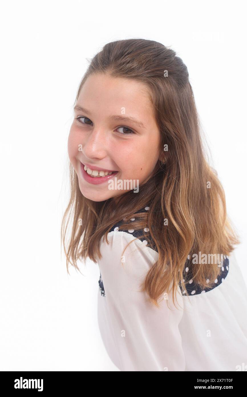 portrait of a cheerful preteen girl on white background Stock Photo - Alamy