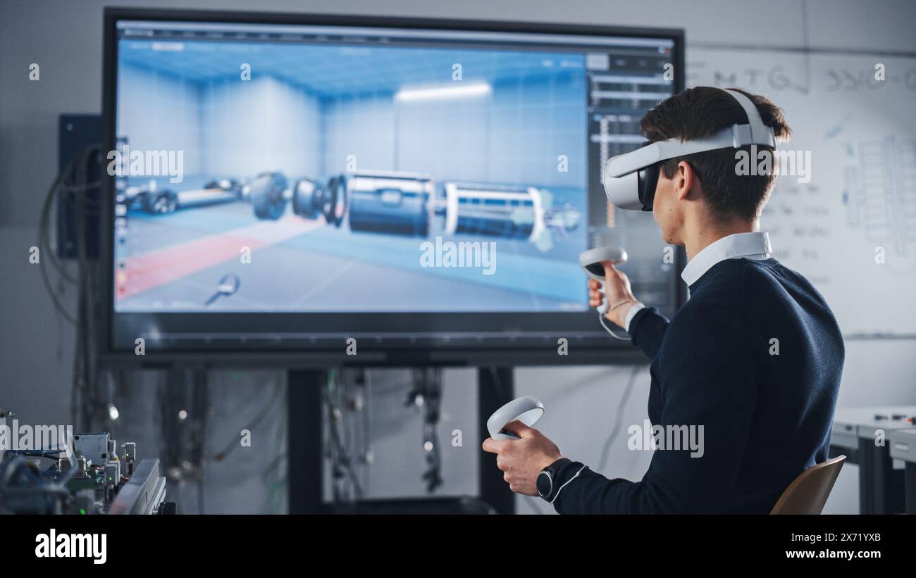 Student Mechanical Engineer in VR Headset and Controllers, Uses VR Technology for Industrial Design, Development, Prototyping in CAD Software on Computer. Augmented Reality Concept. Stock Photo