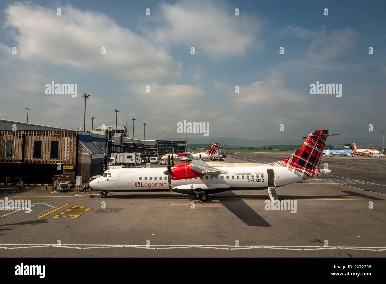 Glasgow, May 16th 2024: Saab 340B airplane belonging to Logan Air at Glasgow Airport Stock Photo