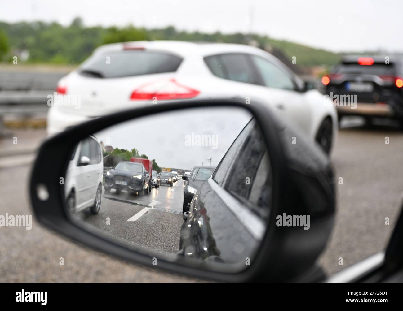 Stuttgart, Germany. 17th May, 2024. Cars are packed tightly together on a main road near Stuttgart. Traffic experts are predicting long traffic jams at the start of the Whitsun vacations. Credit: Bernd Weißbrod/dpa/Alamy Live News Stock Photo