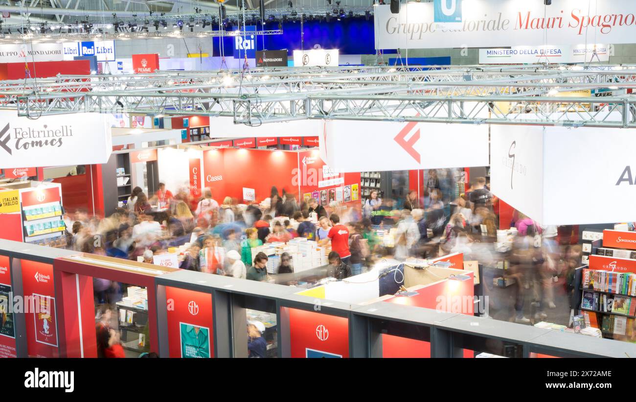 Visitors passing among the stands of 2024 Turin Book Fair (Salone internazionale del libro di Torino) Stock Photo