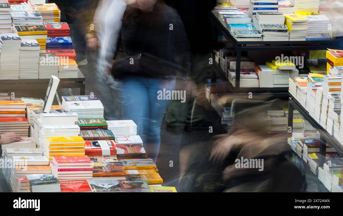 Visitors passing among the stands of 2024 Turin Book Fair (Salone internazionale del libro di Torino) Stock Photo