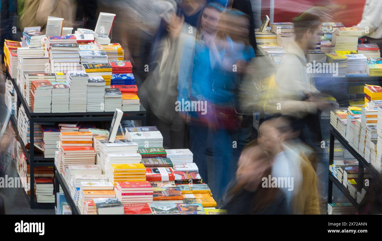 Visitors passing among the stands of 2024 Turin Book Fair (Salone internazionale del libro di Torino) Stock Photo