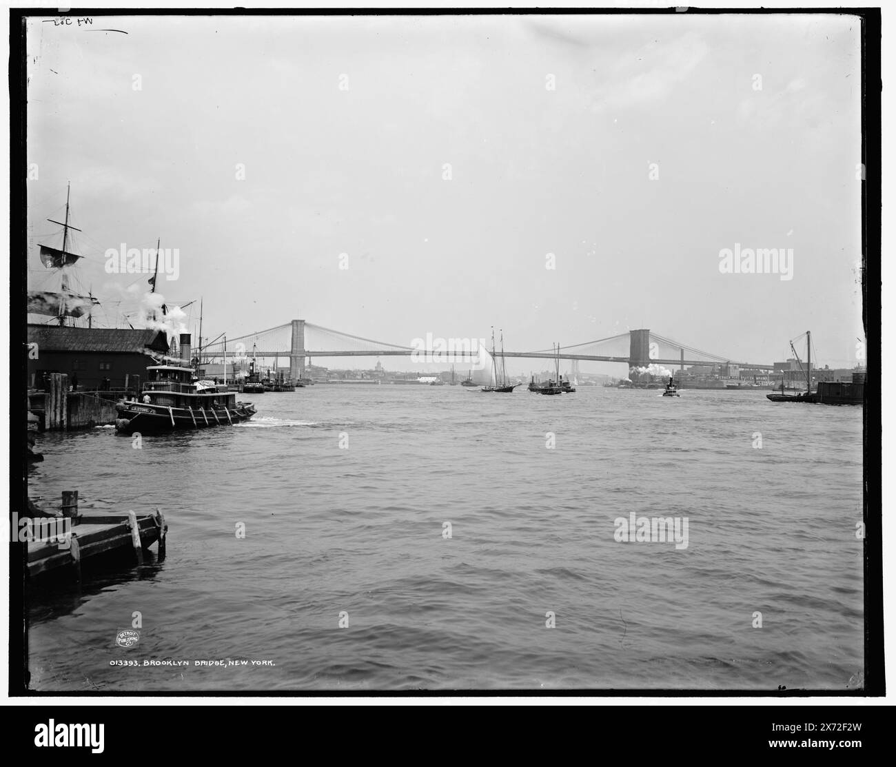 Brooklyn Bridge, New York, Date based on Detroit, Catalogue J Supplement (1901-1906)., 'C.R. Stone' on tugboat at center left., 'WHJ 305' on negative., Detroit Publishing Co. no. 013393., Gift; State Historical Society of Colorado; 1949,  Bridges. , Harbors. , United States, New York (State), New York. , United States, New York (State), East River. Stock Photo