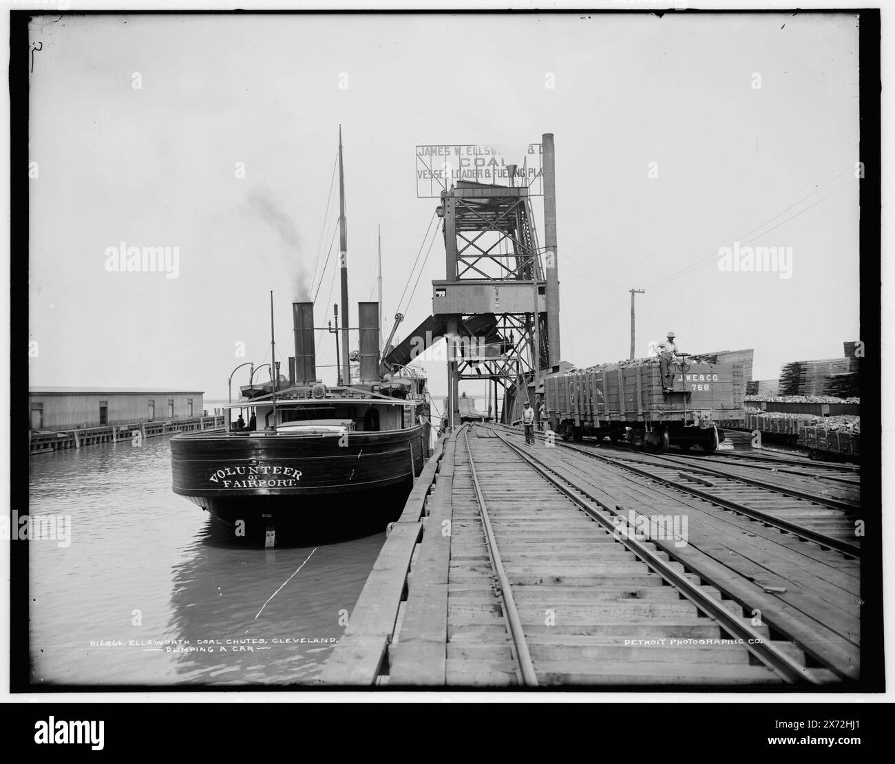 Dumping a car, Ellsworth coal chutes, Cleveland, Date based on Detroit, Catalogue J (1901)., '5' on negative., Detroit Publishing Co. no. 012864., Gift; State Historical Society of Colorado; 1949,  Coal. , Shipping. , Cargo ships. , Railroads. , United States, Ohio, Cleveland. Stock Photo