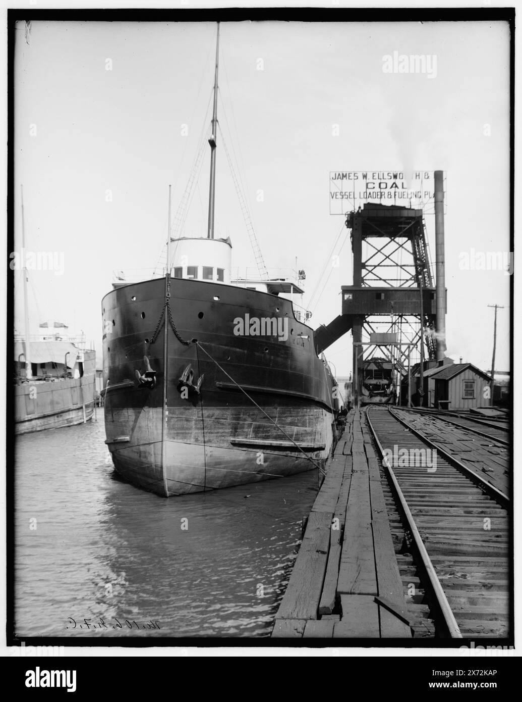 Freighter Midland King, Cleveland, Ohio, Title from jacket., 'No. 106 G.F.C.' on negative., 'James Ellsworth, local vessel loader & fueling plant' on sign., Detroit Publishing Co. no. 500391., Gift; State Historical Society of Colorado; 1949,  Midland King (Freighter) , Coal. , Cargo ships. , Shipping. , United States, Ohio, Cleveland. Stock Photo