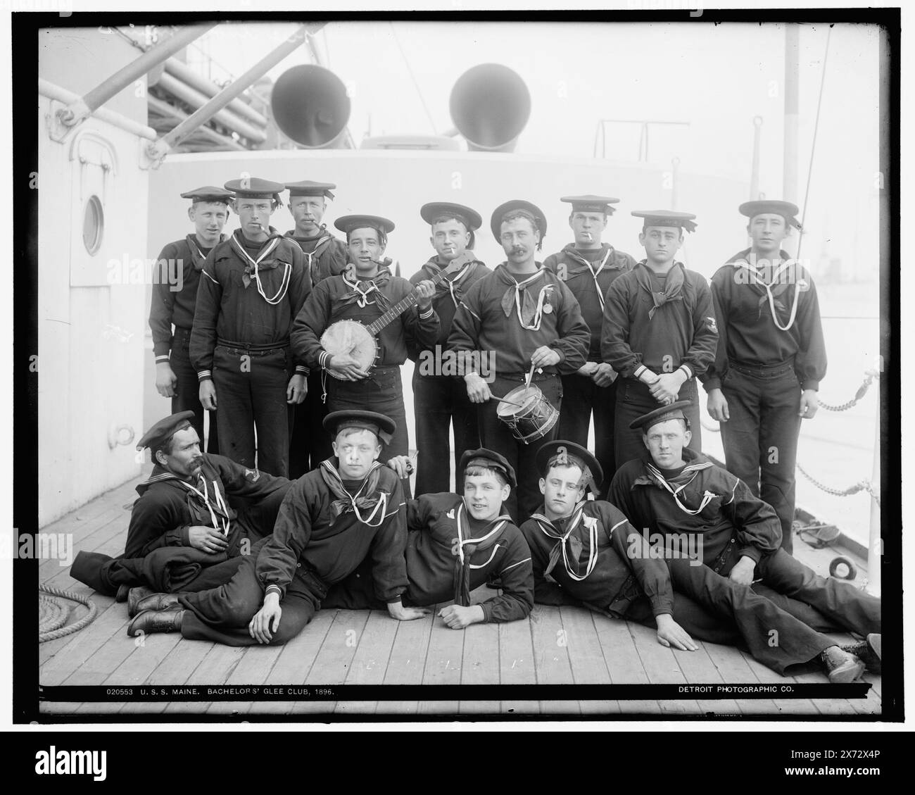 U.S.S. Maine, bachelors' glee club, 'Hart' on negative., Detroit Publishing Co. no. 020553., Gift; State Historical Society of Colorado; 1949,  Maine (Battleship) , United States., Navy. , Battleships, American. , Seamen, American. , Singers. Stock Photo