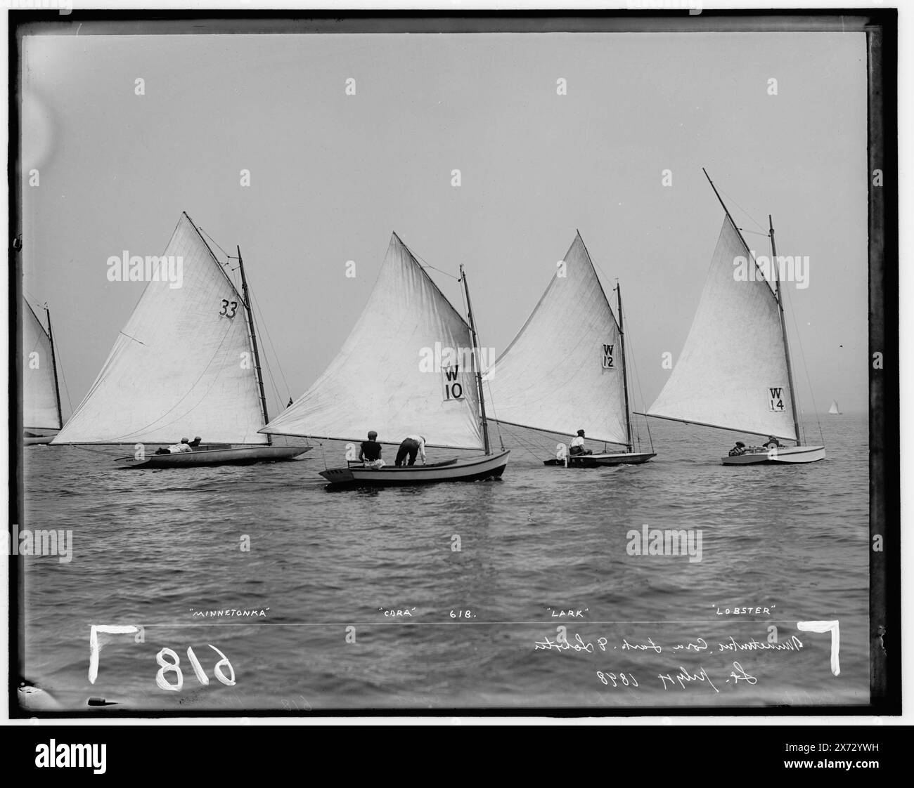 Minnetonka, Cora, Lark, and Lobster, Attribution based on style of title and numbering., Title names boats from left to right., Probably Larchmont Yacht Club., '618' and 'Lt.' on negative., No Detroit Publishing Co. no., Gift; State Historical Society of Colorado; 1949,  Minnetonka (Yacht) , Cora (Yacht) , Lark (Yacht) , Lobster (Yacht) , Yachts. , Regattas. Stock Photo