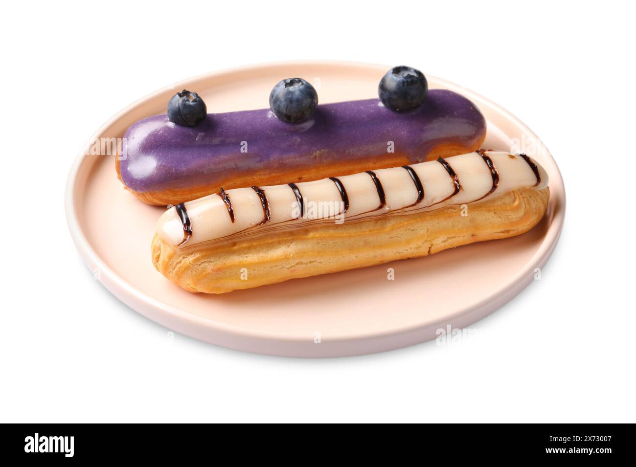 Delicious eclairs covered with glaze isolated on white Stock Photo