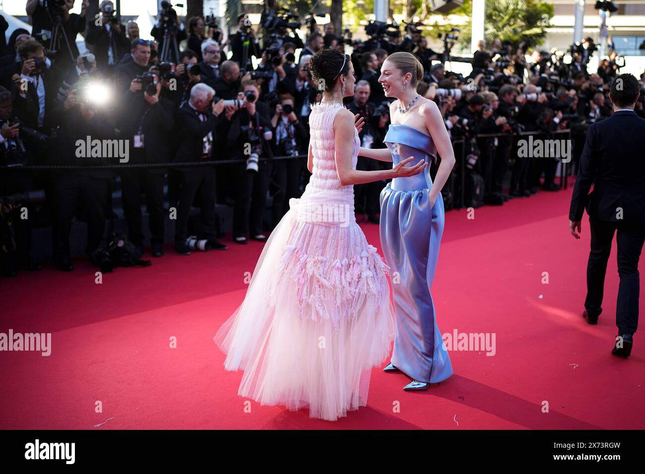 margaret-qualley-left-and-hunter-schafer-pose-for-photographers-upon