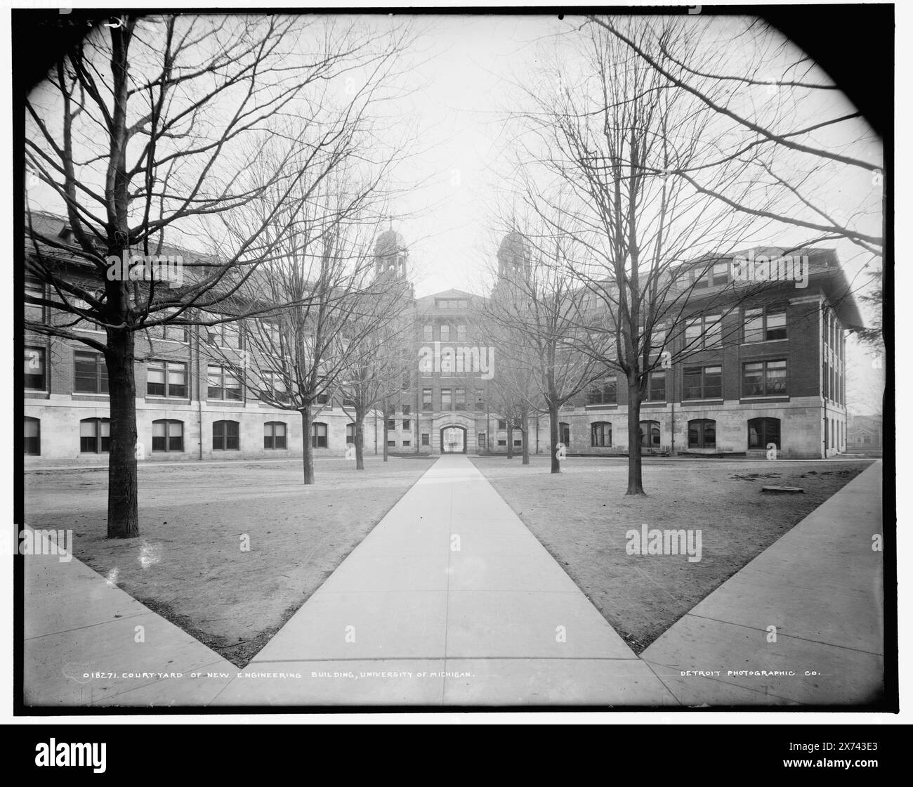 Court-yard of new Engineering Building, University of Michigan, Date based on Detroit, Catalogue P (1906)., 'G 2426' on negative., Detroit Publishing Co. no. 018271., Gift; State Historical Society of Colorado; 1949,  University of Michigan, Buildings. , Universities & colleges. , Educational facilities. , Courtyards. , United States, Michigan, Ann Arbor. Stock Photo