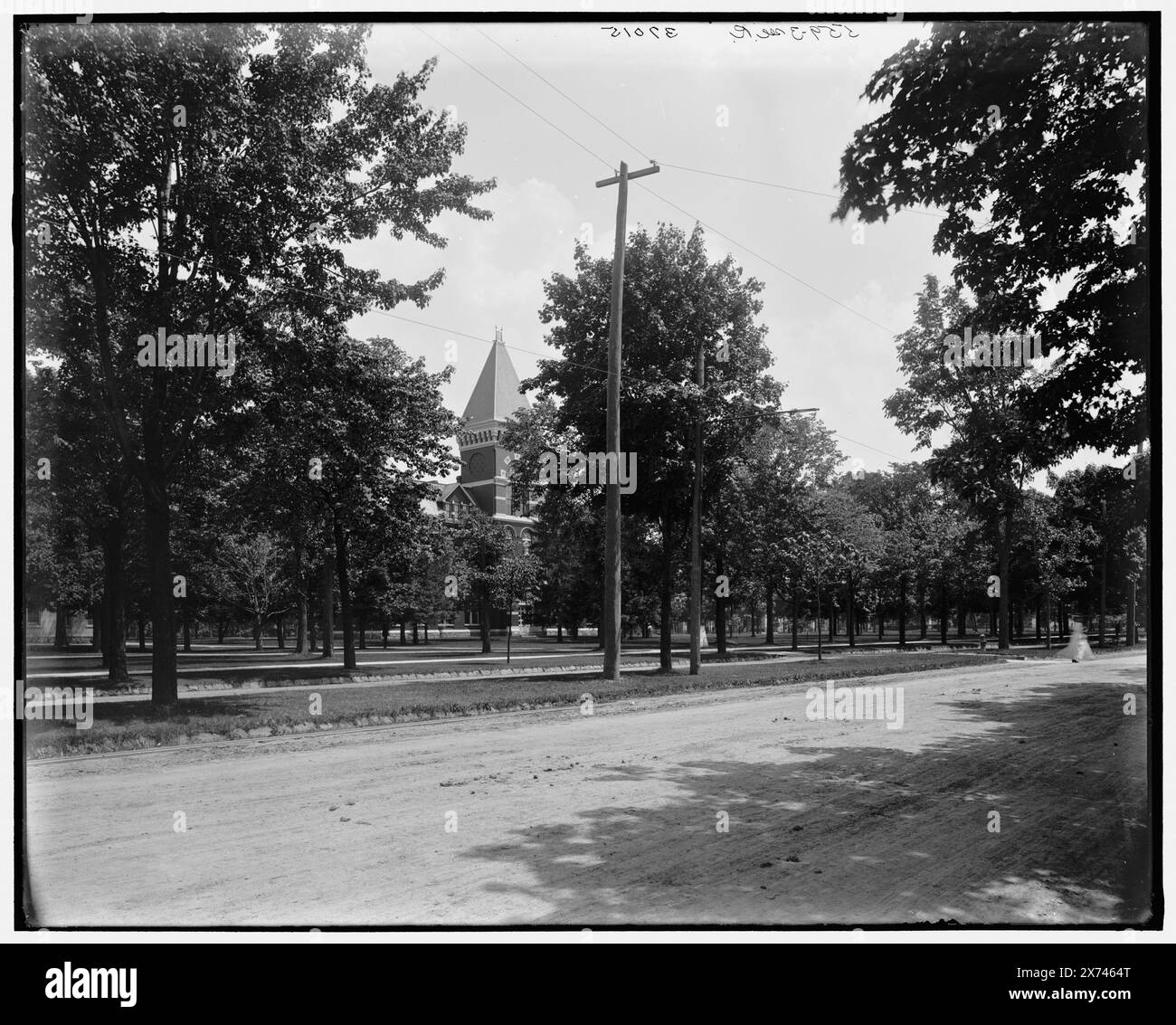 University of Michigan campus, Ann Arbor, Mich., Title from jacket., Videodisc images are out of sequence; actual left to right order is 1A-18956, 18955, 18954., '557' on left negative; '558' on center negative; '559' on right negative., Detroit Publishing Co. no. 037015., Gift; State Historical Society of Colorado; 1949,  Universities & colleges. , Streets. , United States, Michigan, Ann Arbor. Stock Photo