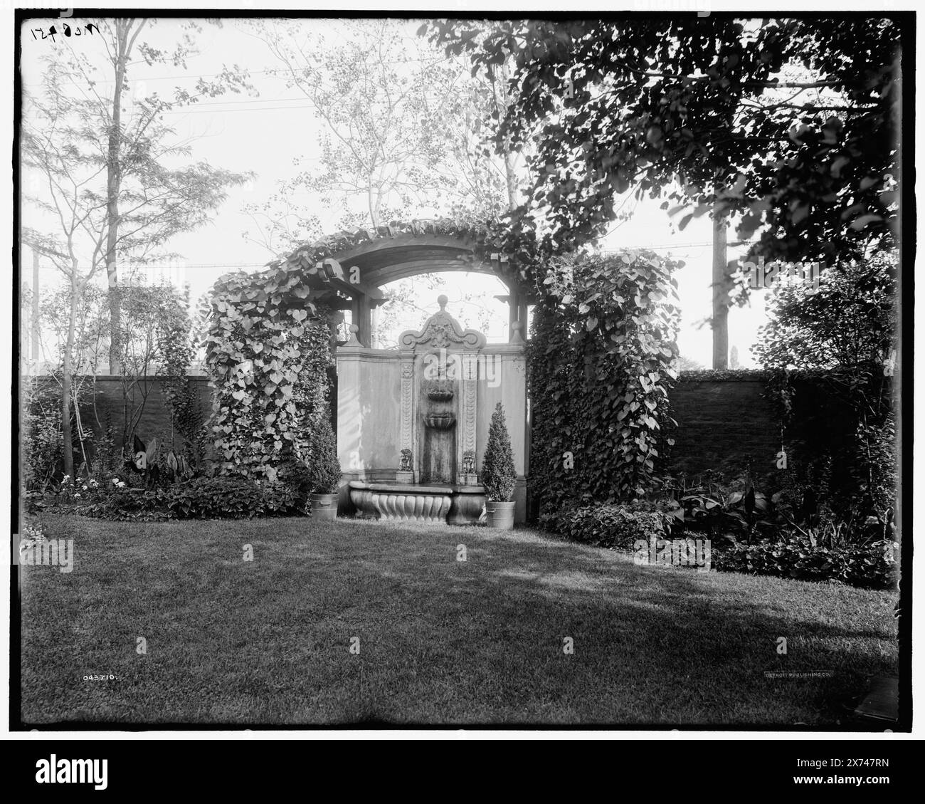 Detroit, Mich., Franklin H. Walker residence, fountain, Title from jacket., 'McC 451' on negative., Detroit Publishing Co. no. 043710., Gift; State Historical Society of Colorado; 1949,  Fountains. , United States, Michigan, Detroit. Stock Photo