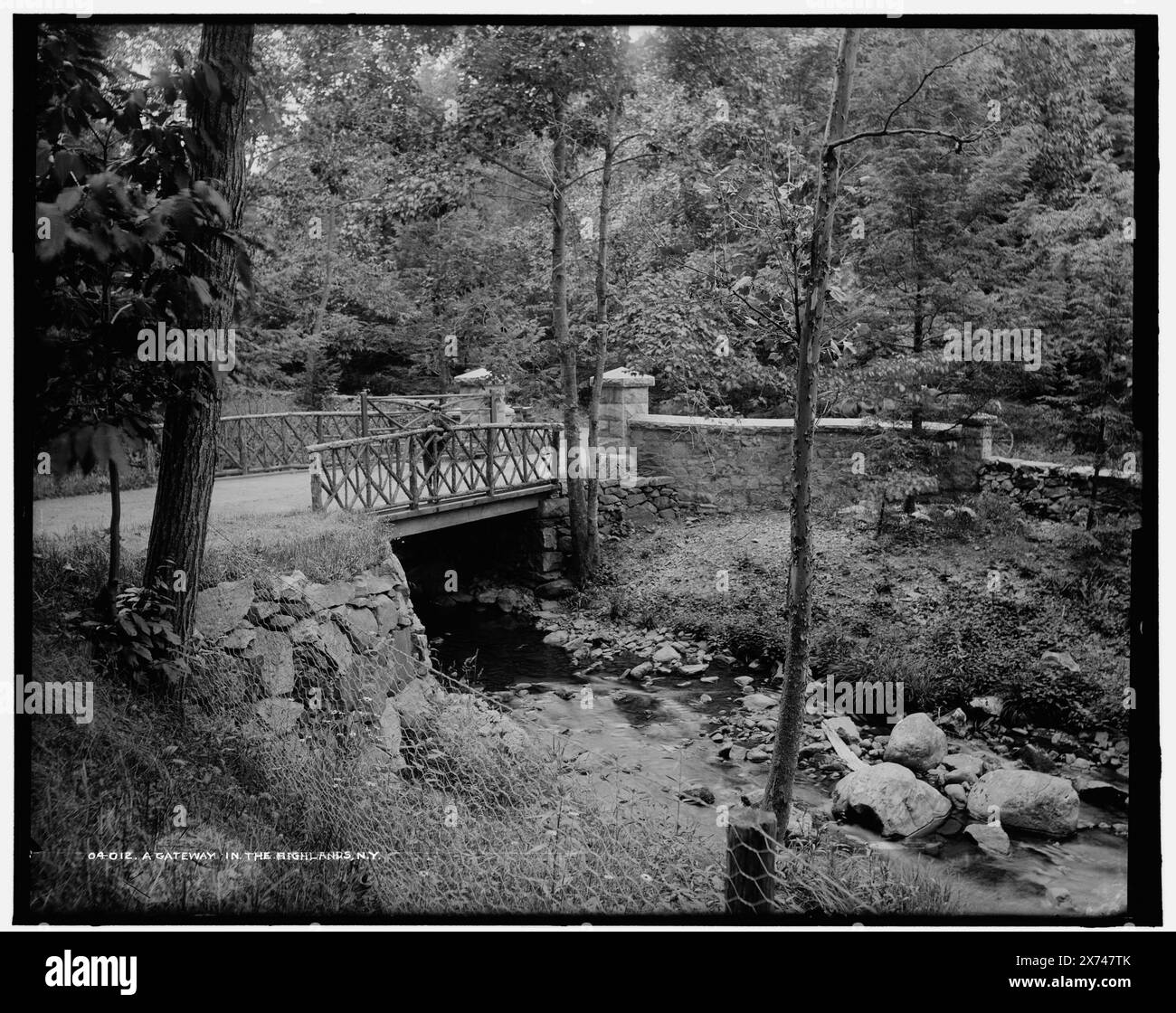Gateway in the Highlands, N.Y., Attribution to Jackson based on Catalogue of the W.H. Jackson Views (1898)., Detroit Publishing Co. no. 04012., Gift; State Historical Society of Colorado; 1949,  Pedestrian bridges. , Streams. , United States, New York (State) Stock Photo