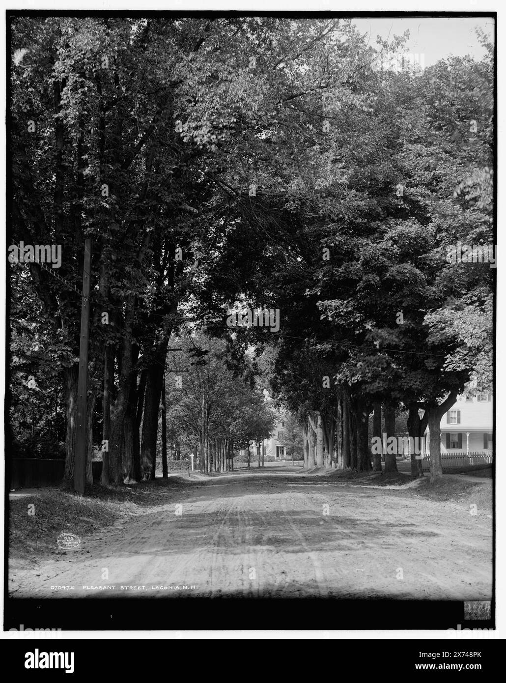 Pleasant Street, Laconia, N.H., '4399' on negative., Detroit Publishing Co. no. 070472., Gift; State Historical Society of Colorado; 1949,  Residential streets. , United States, New Hampshire, Laconia. Stock Photo