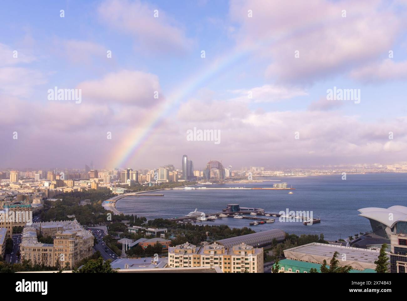 Big rainbow over the bay of Baku city. Azerbaijan. Stock Photo