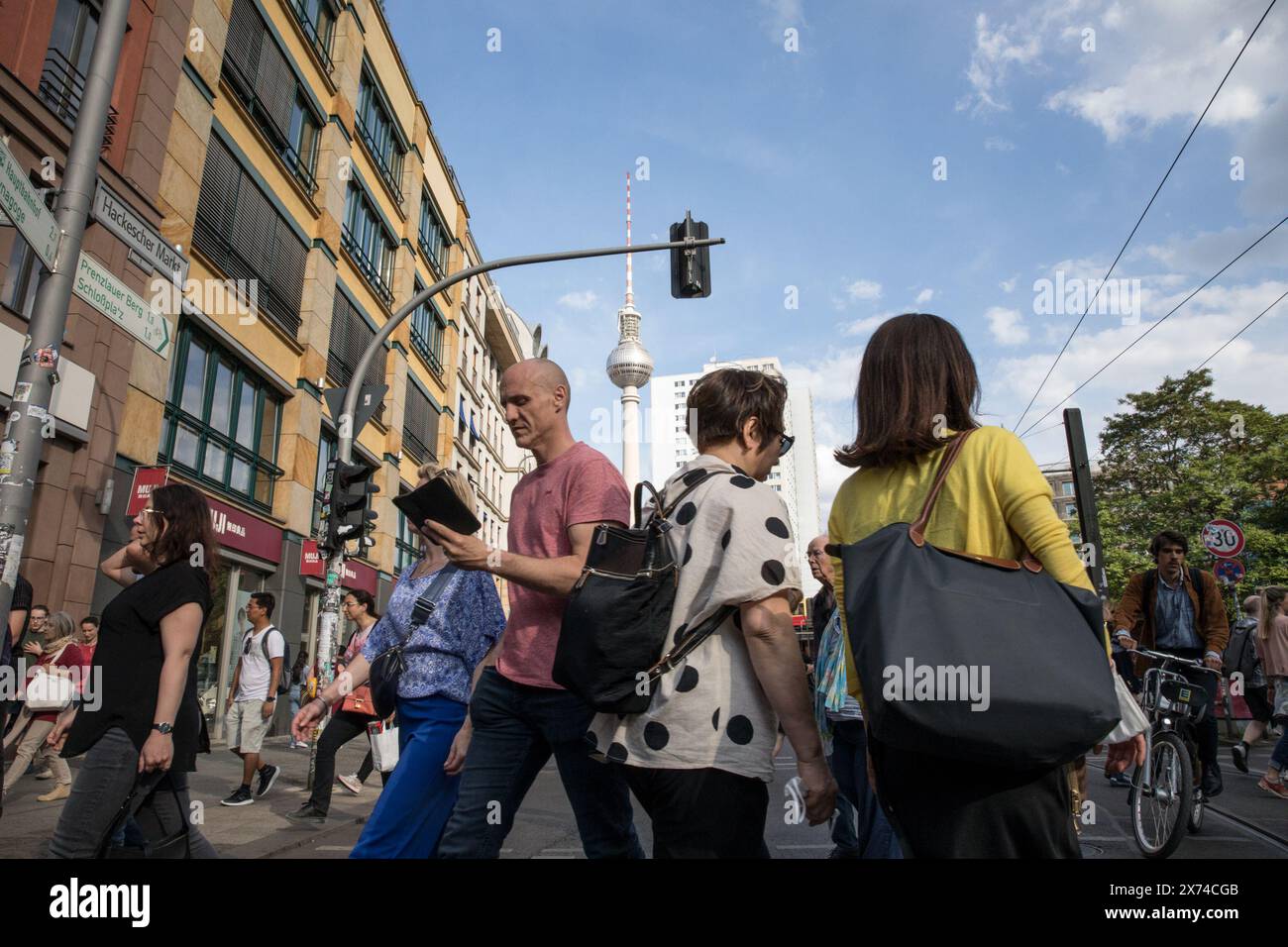 May 17, 2024, Berlin, Germany: As people hustle across the busy streets ...