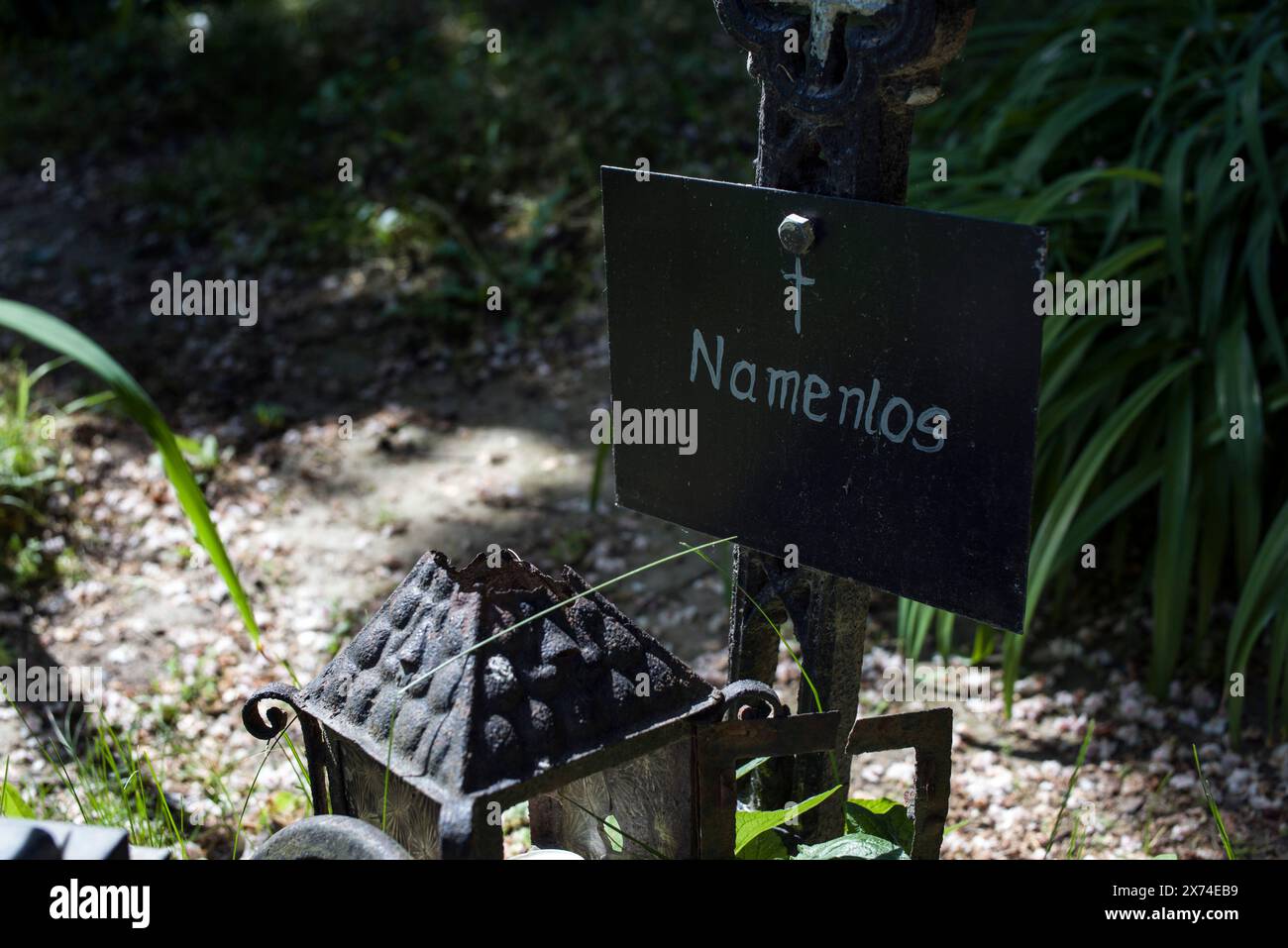 Vienna, Austria. 5th May, 2024. Many graves merely display ''˜Namenlos' (''˜nameless') or some variation thereof, followed by e. g. the date of when the body was discovered. The Cemetery of the Nameless - Friedhof der Namenlosen, is located at the on the outskirts of Vienna next to the Alberner Harbor - nearby the junction of the Danube Canal and the Danube itself. In the past, the Danube used to wash up the bodies of people who had drowned or been murdered here because of a water vortex. Many of them remained unidentified - nameless (namenlos in german). Buried here are people who were wash Stock Photo