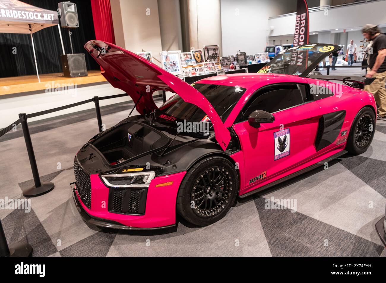New York City, USA - March 27, 2024: Audi R8 sportscar pink car with ...