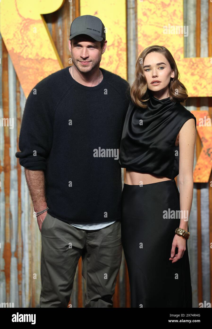 London, UK. 17 May, 2024. Liam Hemsworth and Gabriella Brooks attend