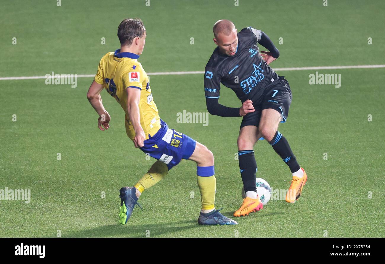 Sint Truiden, Belgium. 17th May, 2024. STVV's Matte Smets and OHL's Jon