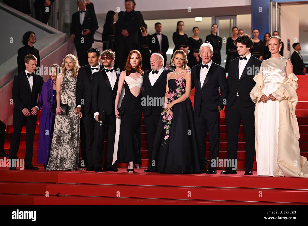 (left to right) Tiffany Boyle, Luisa Law, Tiffany Boyle, a guest, Andrew Wonder, Taylor Jeanne, Paul Schrader, Penelope Mitchell, Alejandra Silva, Richard Gere, Homer James Jigme Gere and Uma Thurman arrive for the screening of the film 'Oh Canada' during the 77th Cannes Film Festival in Cannes, France. Picture date: Friday May 17, 2024. Stock Photo