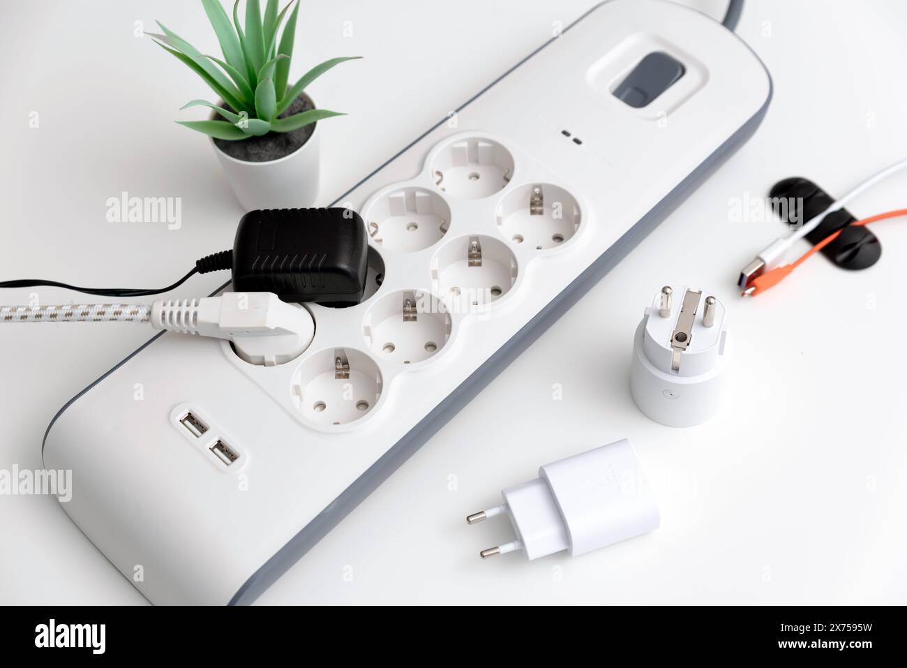 Electric power strip. Power plugs and a one multi socket electrical ...