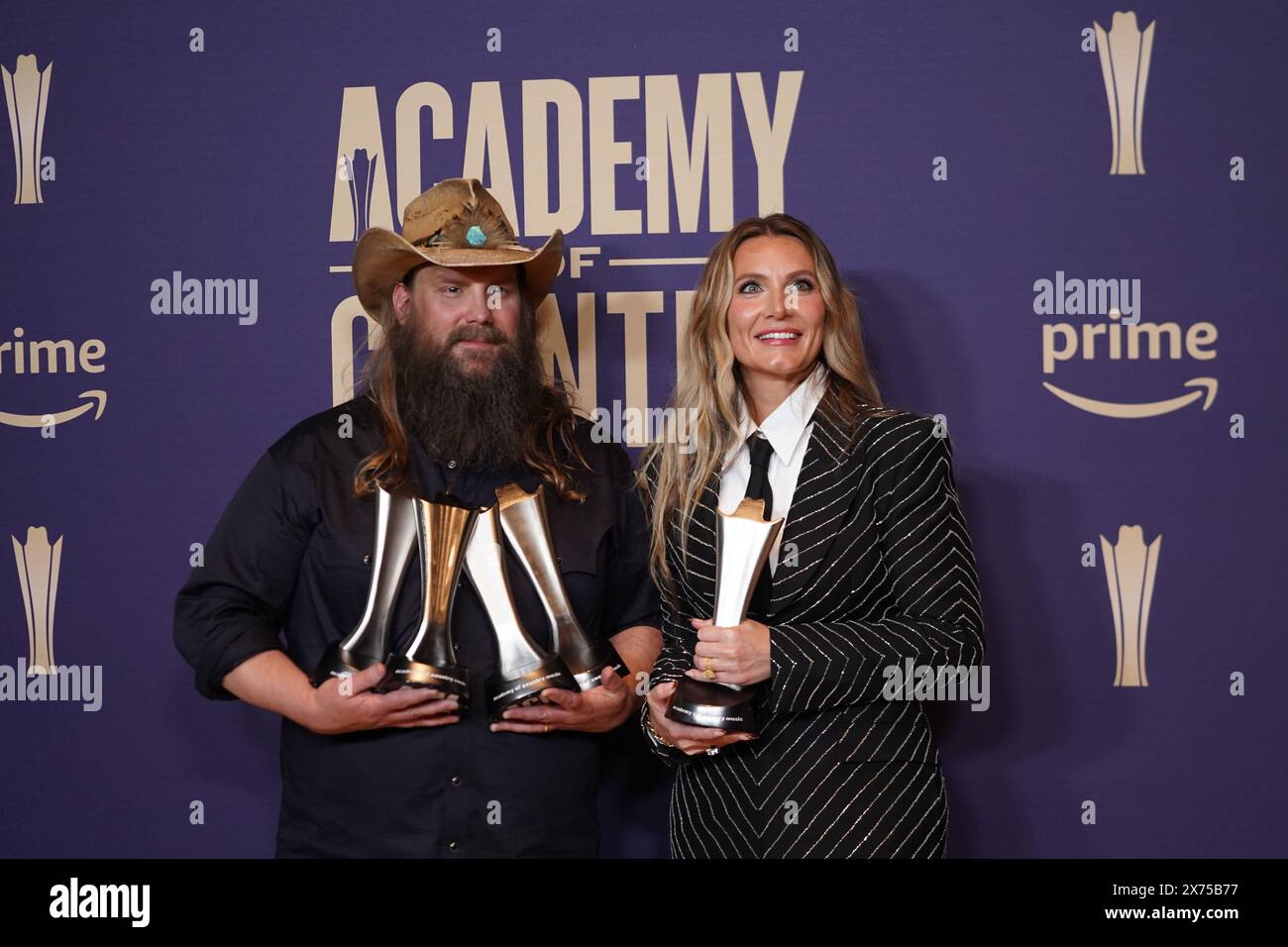 Frisco, United States. 16th May, 2024. (L-R) Morgane Stapleton and Chris Stapleton, winners of the Album of the Year award for ''Higher, '' are posing with their prizes in the press room during the 59th Academy of Country Music Awards Ceremony at The Ford Center at the Star in Frisco, United States, on May 16, 2024. (Photo by Javier Vicencio/Eyepix Group) (Photo by Eyepix/NurPhoto) Credit: NurPhoto SRL/Alamy Live News Stock Photo