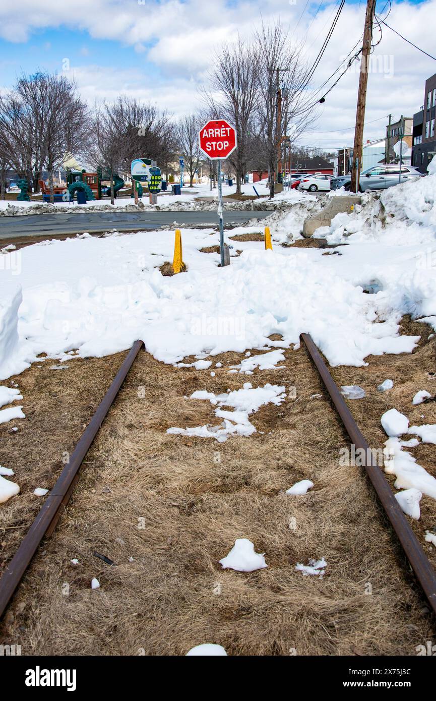 Bilingual stop sign and train buffers in Miramichi, New Brunswick ...