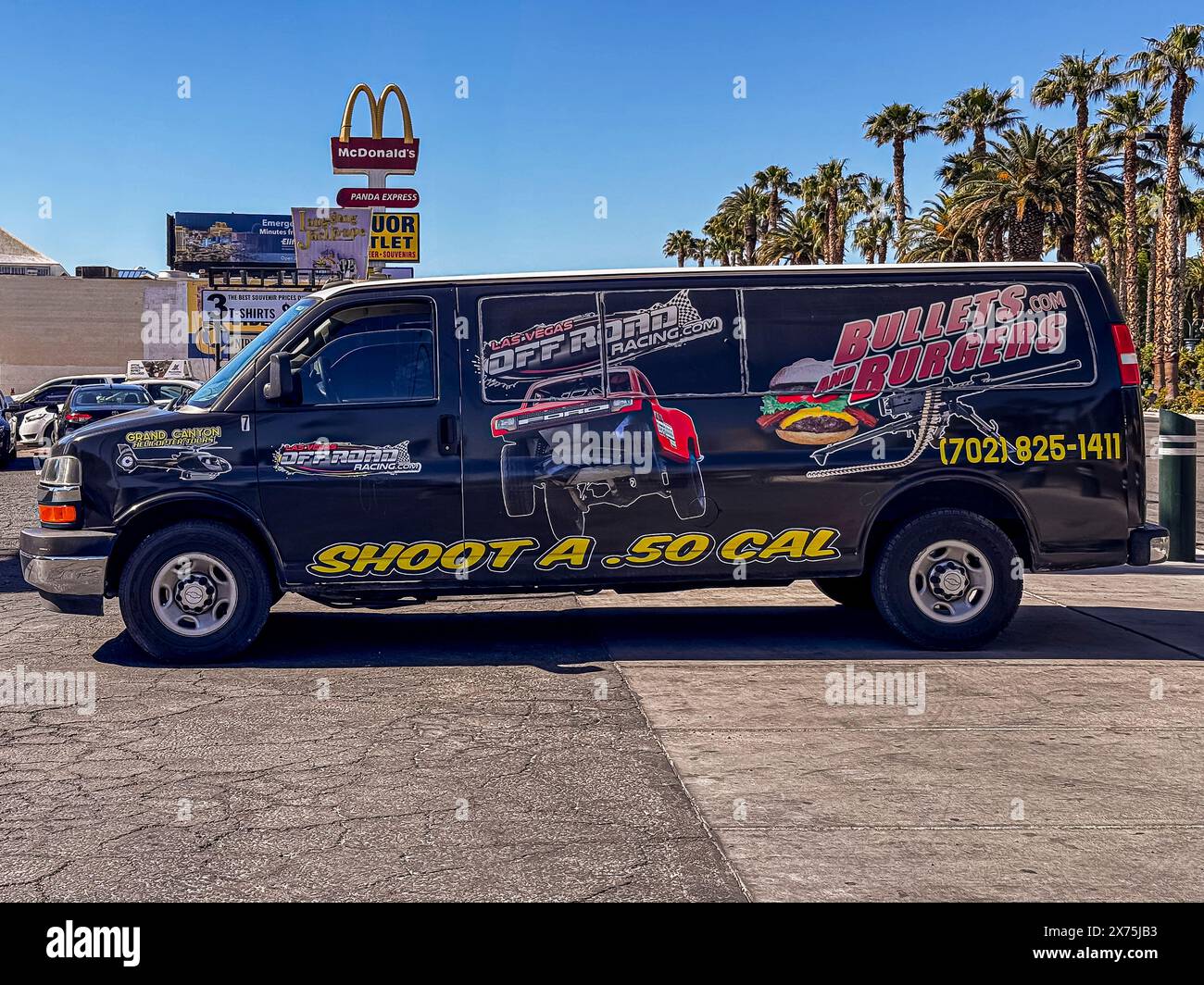 Las Vegas, NV, USA - May 12, 2024: Bullets and Burgers van with promotional colorful machine gun and off-road truck images painted on it. McDonald's s Stock Photo